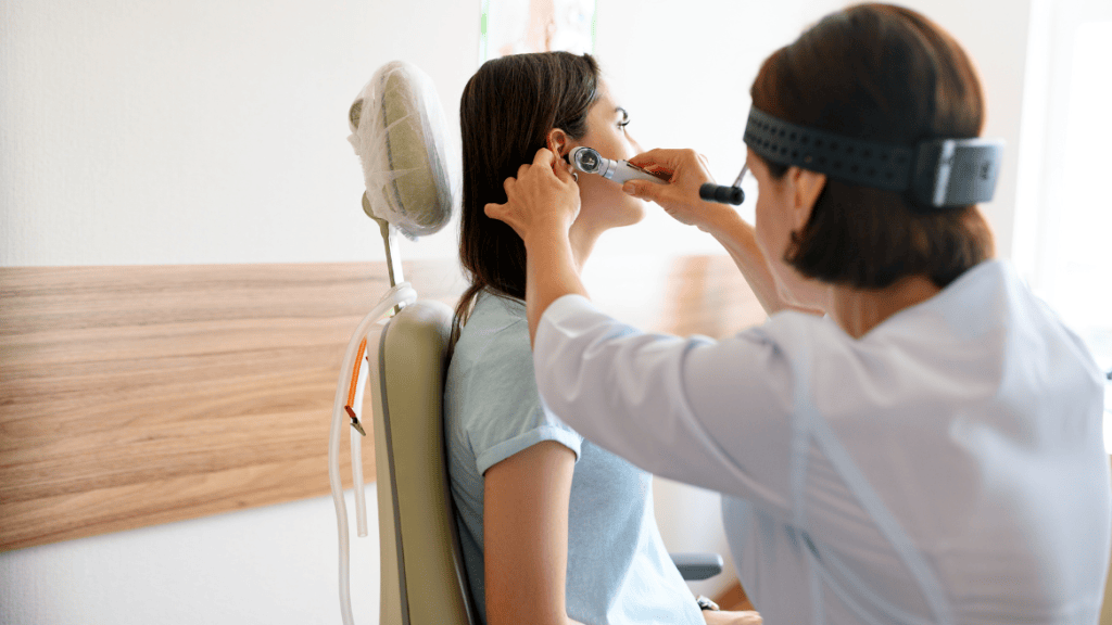 Patient getting ear micro suction done at Omnicare Pharmacy